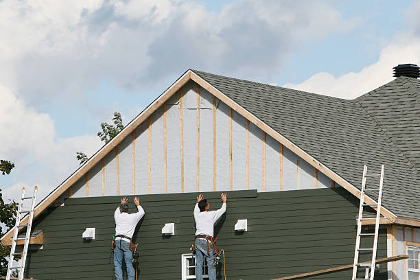 Professional Siding Replacement technician working in Katy, TX